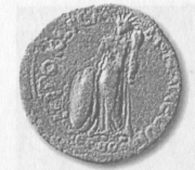 Рис. 74. Культовая статуя богини Ma в Комане. Монета римского времени